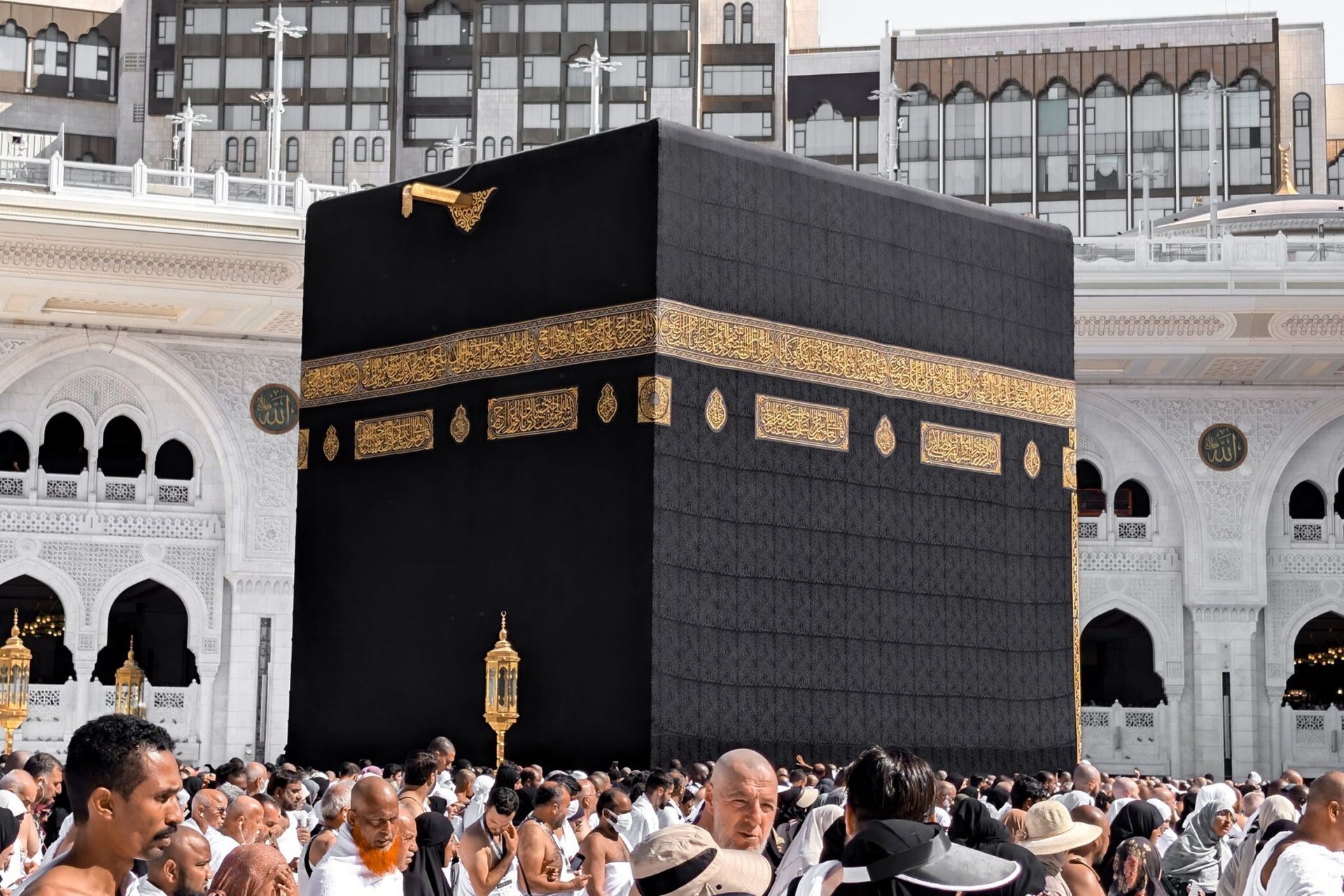 A large group of pilgrims gathers at the holy Kaaba during the Hajj pilgrimage in Mecca, Saudi Arabia.