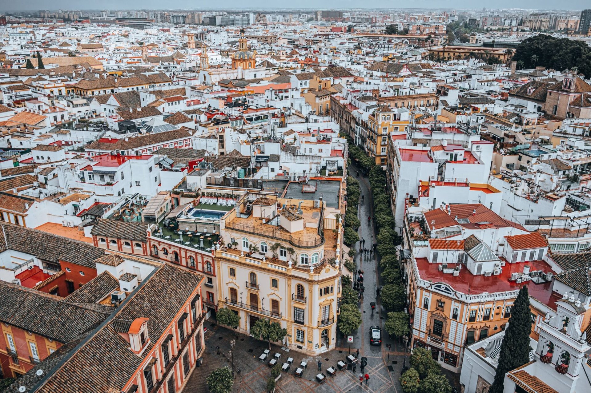Captivating aerial view of Seville, Spain showcasing its dense, historic urban architecture.