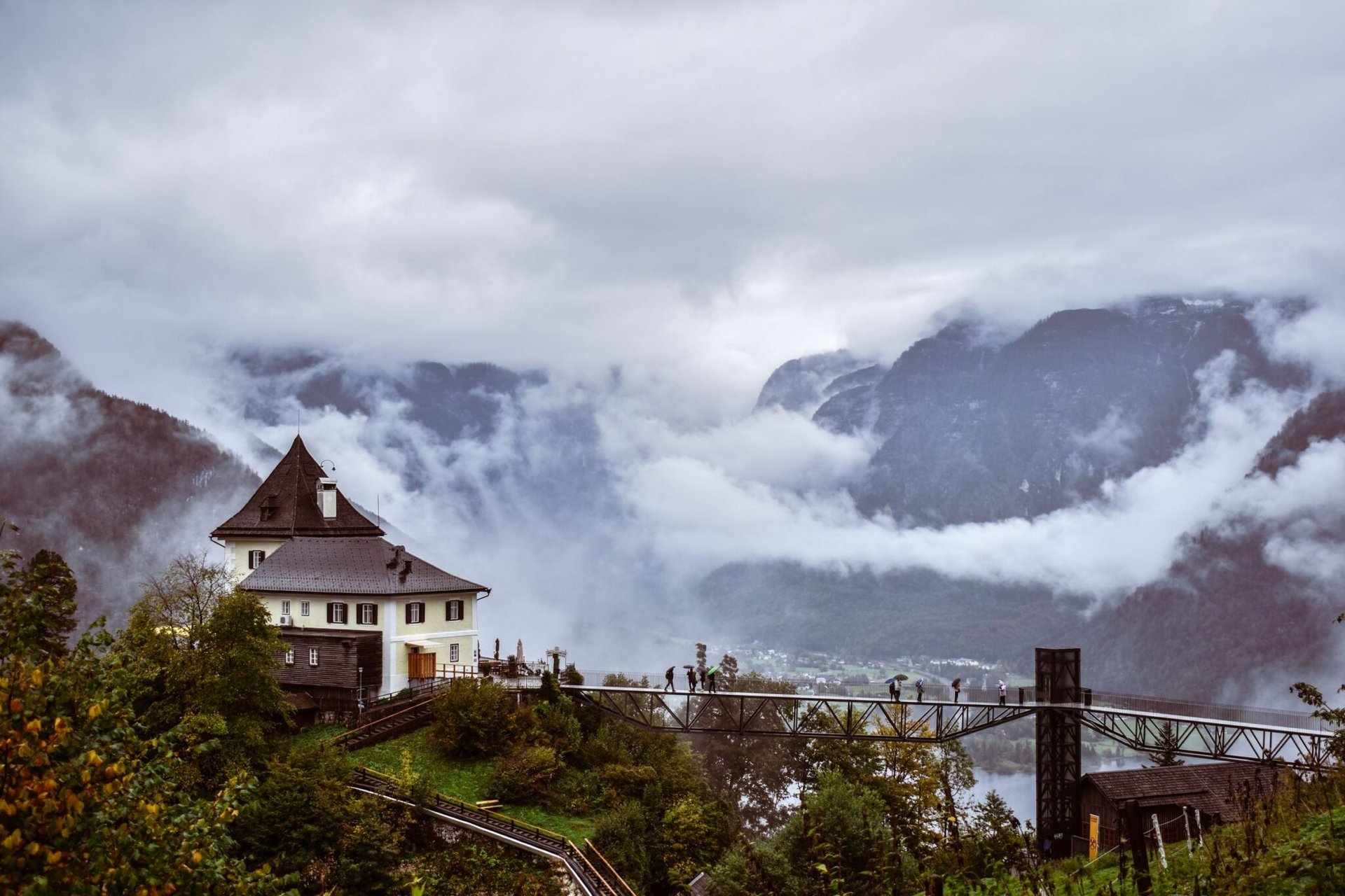 Beautiful mountain landscape with a bridge and clouds in Hallstatt, Austria.