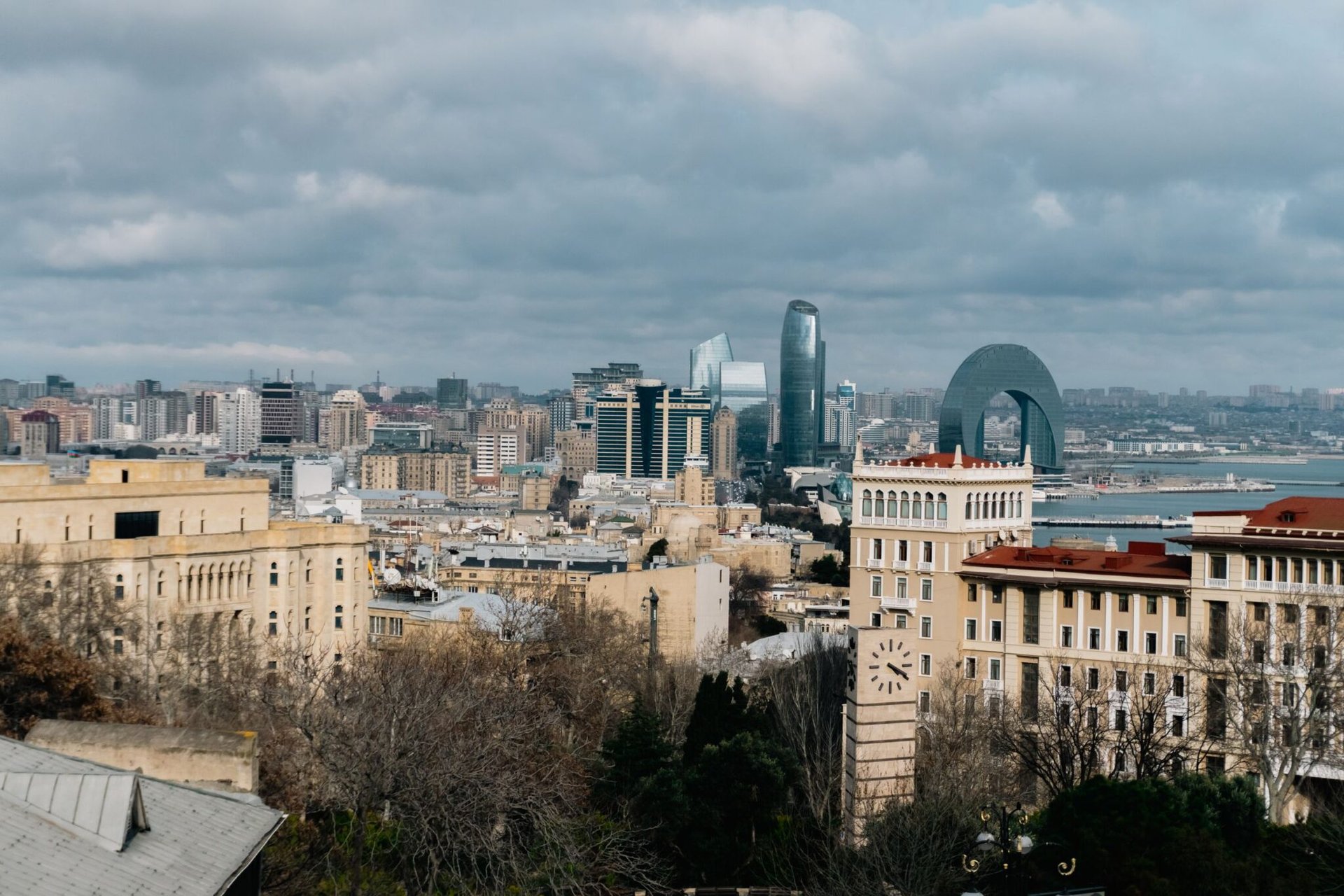 Overcast cityscape of Baku, Azerbaijan with iconic architecture and urban skyline.