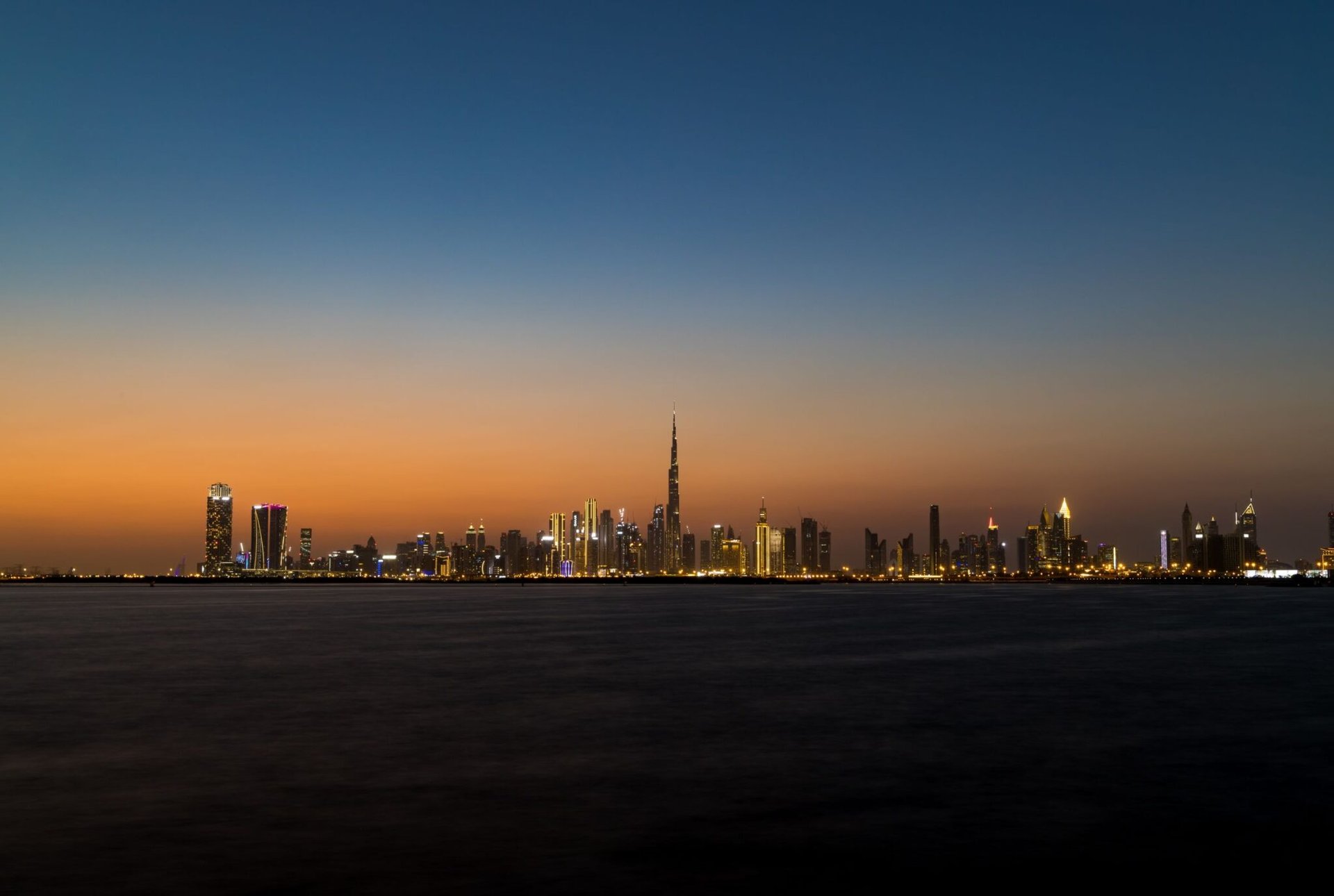 Stunning view of Dubai's skyline at twilight featuring the iconic Burj Khalifa.