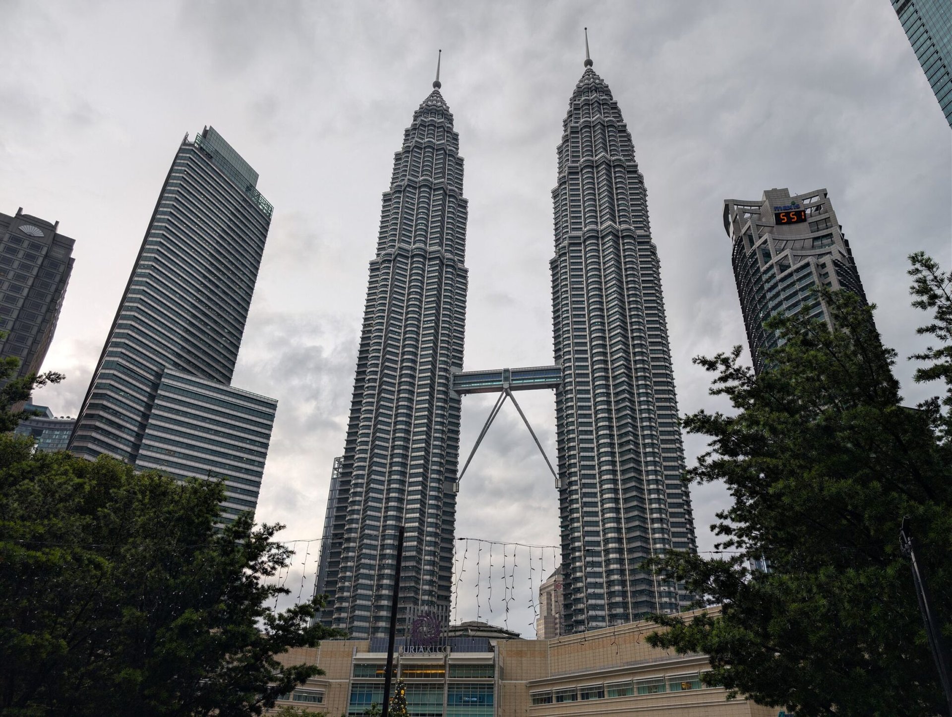 Stunning view of the Petronas Twin Towers in Kuala Lumpur, Malaysia. Iconic modern architecture.