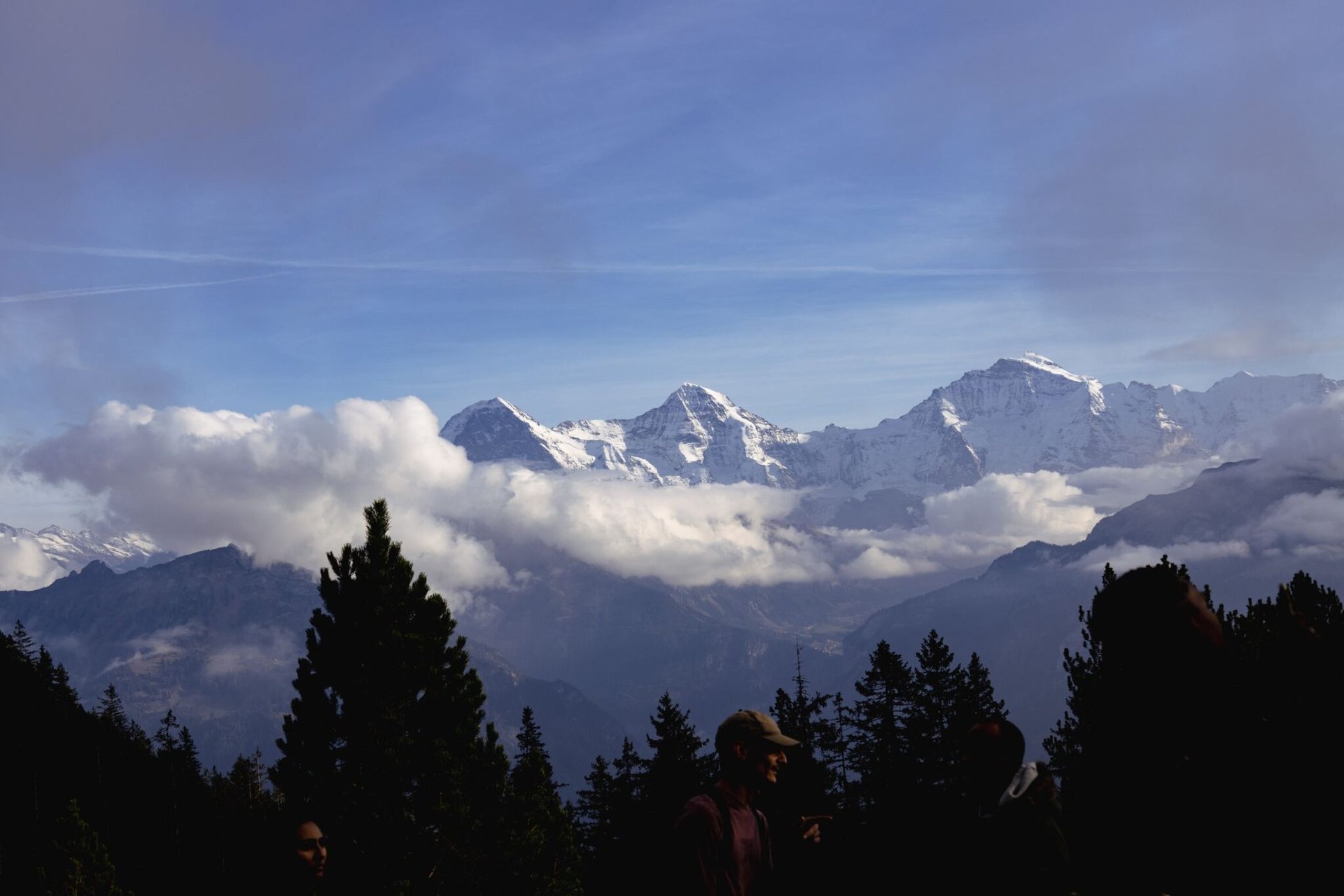 Snow-capped peaks and clouds over the Swiss Alps in Interlaken.