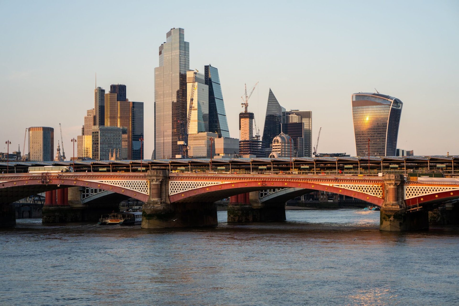 Captivating view of London's skyline featuring iconic skyscrapers and the River Thames.