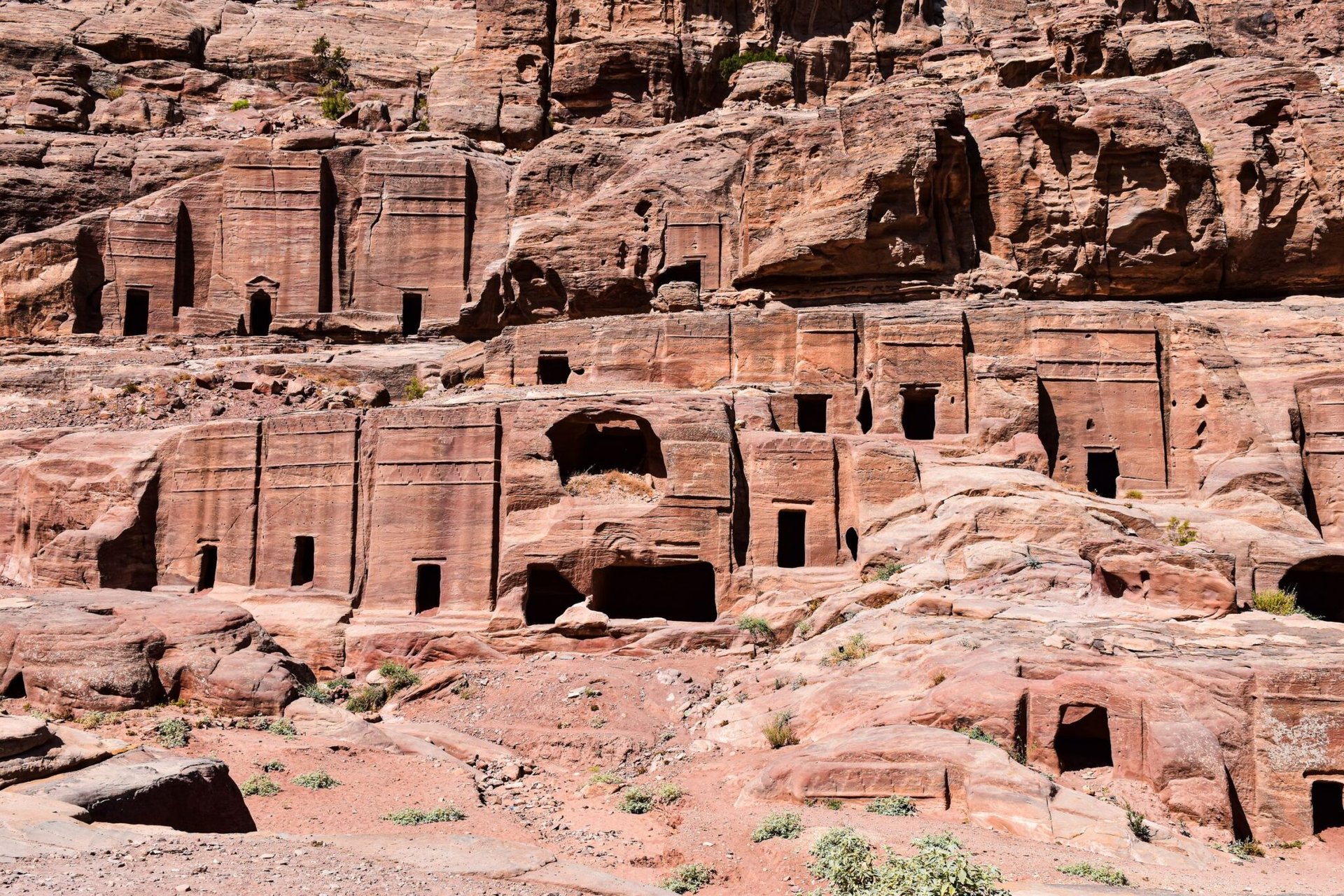 Discover the ancient rock-cut tombs in Petra, showcasing historical architecture in Jordan.