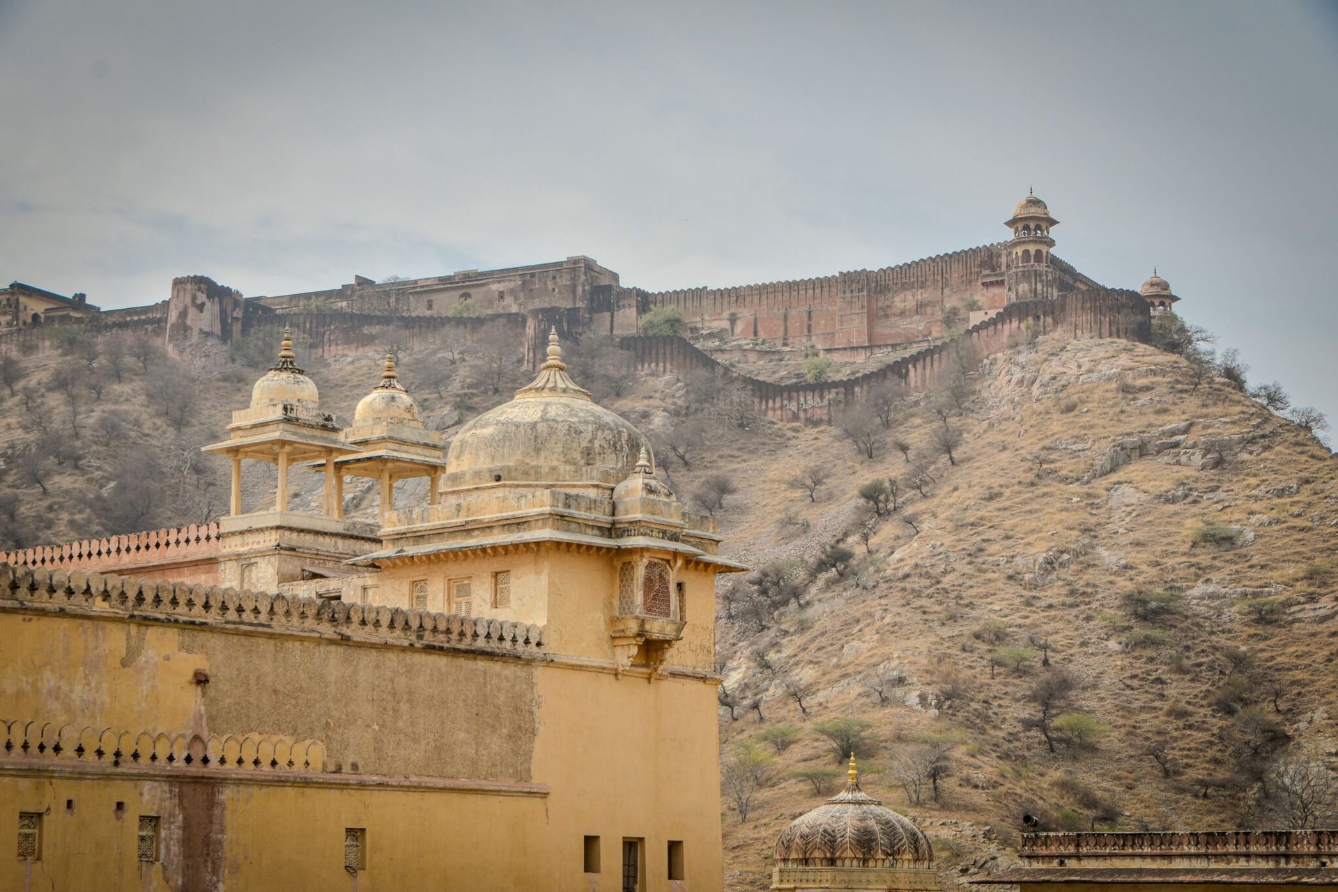 Historic Jaigarh Fort with rugged hills and impressive walls in Jaipur, India.