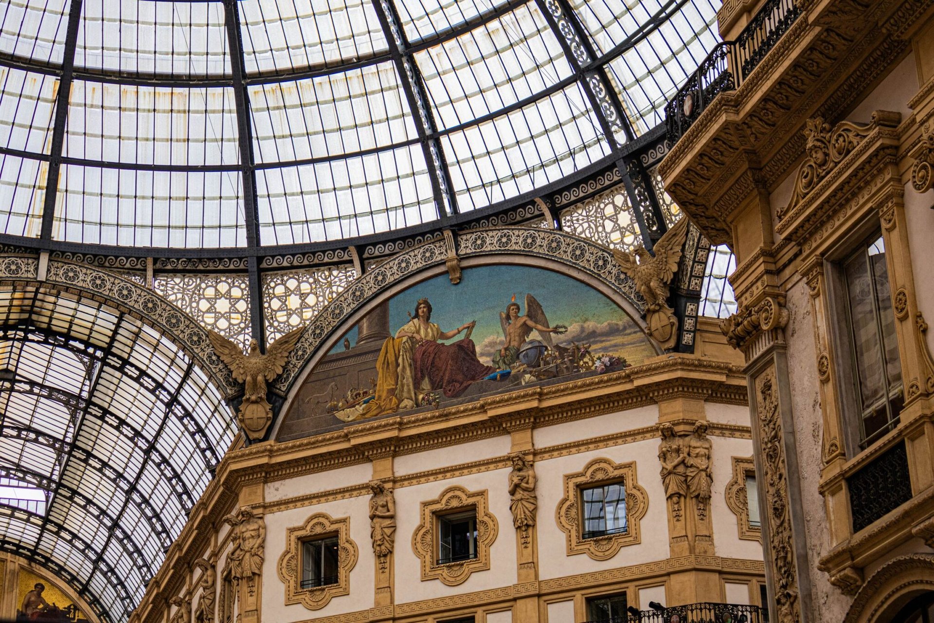 Explore the art and elegant architecture of Galleria Vittorio Emanuele II in Milan, Italy.