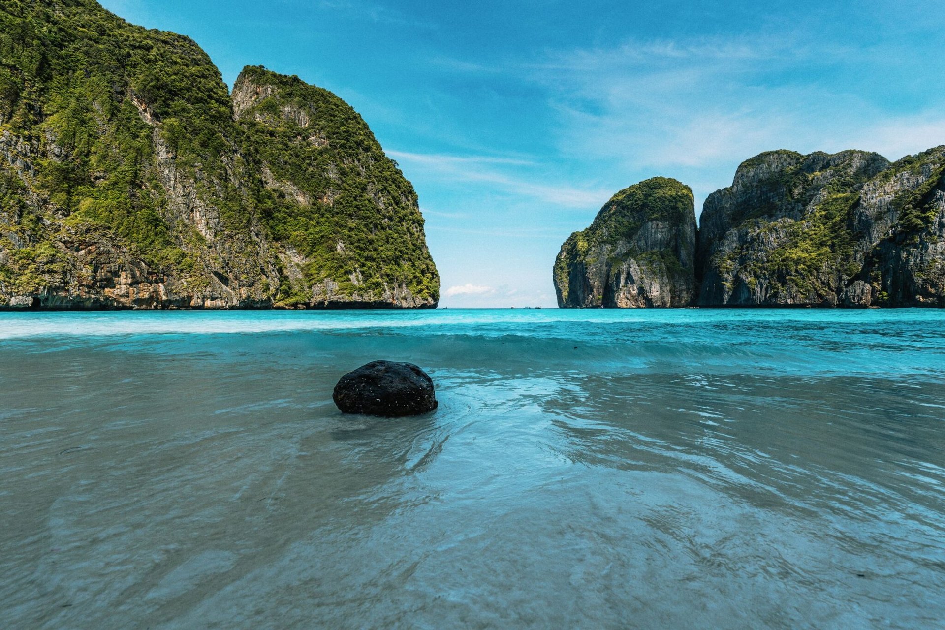 Explore the serene beauty of Maya Bay in Krabi, Thailand with pristine beaches and turquoise waters.