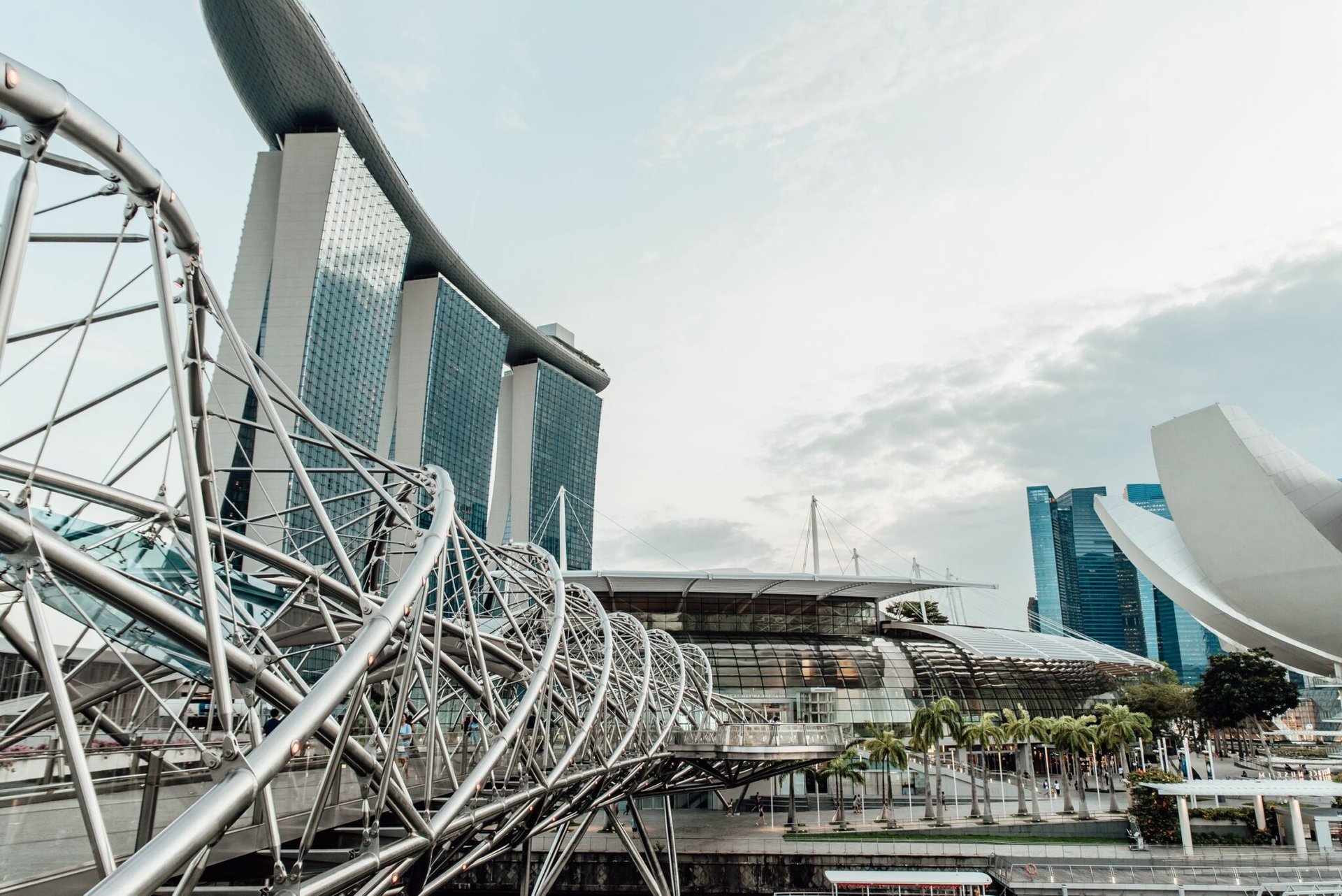 Modern architectural marvel featuring Marina Bay Sands and Helix Bridge in Singapore.